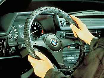 Steering wheel cover, Black, Rallye grip, fits steering wheels up to 16.5 inches in diameter.